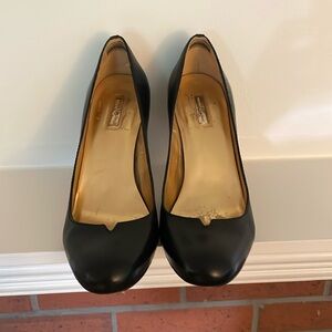 $9 Moving Sale til 8/2! Black leather pumps. Size 7.5